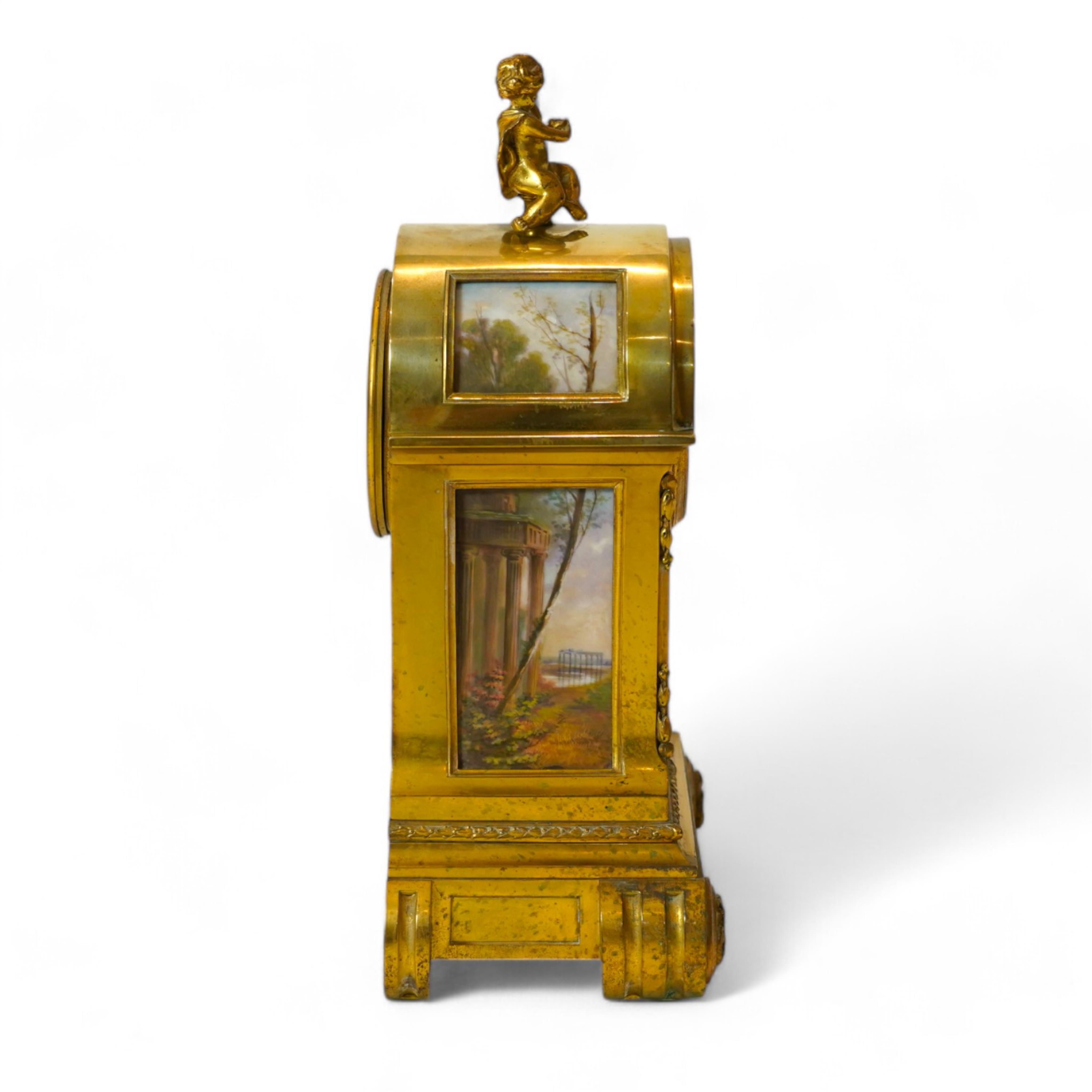 A Louis XVl style gilt brass cased eight day mantel clock